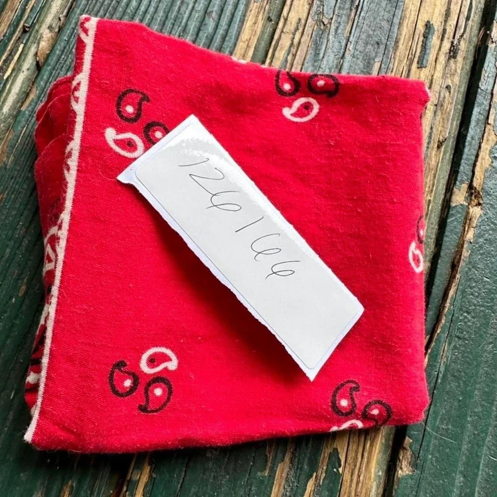 Red bandana scarf with‎ white paisley design